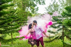 Vibrant Indian couple's engagement photo shoot. indian bride and groom,pre-wedding fashion,indian wedding photography