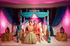 Maharani and Rajah's sangeet portrait. indian bride and groom,flora and decor,pre-wedding celebration