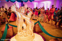 Sangeet celebration. sangeet,indian bride and groom,pre-wedding celebrations,floral an decor