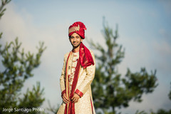 Indian groom custom-made sherwani. indian groom,wedding ceremony fashion,sherwani