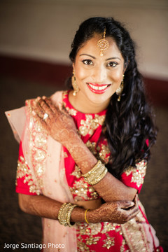 Dazzling Indian bride. indian bridal jewelry,hair and makeup,indian bride reception fashion