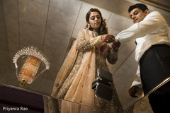 Maharani helping the groom to get ready indian wedding reception fashion,bridal gown,indian groom getting ready