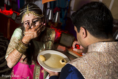 Indian couple having fun during garba mehndi,indian groom,bridal fashion