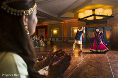 Maharani cheering at guests dancing indian wedding celebrations,pre indian wedding traditions