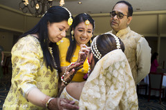 Maharani with her parents and sister indian bride fashion,yellow sari,indian wedding