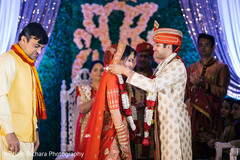Jaimala ritual. indian bride and groom,indian wedding ceremony,flower garlands