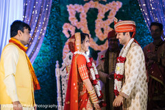 Sweet Indian bride and groom. indian bride and groom,indian wedding ceremony,flower garlands