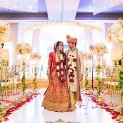 Beautiful Indian newlyweds. indian wedding ceremony,floral and decor,mandap,indian bride and groom
