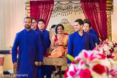 Beautiful Indian bride carried in on a palanquin. indian wedding ceremony,indian bride,indian wedding photography