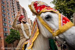 Indian groom riding a white baraat horse. Indian groom riding a white baraat horse.