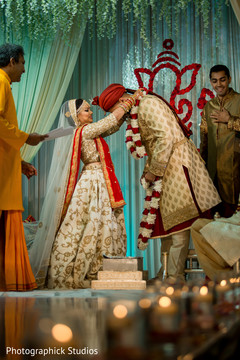 Traditional flower garland exchange. indian wedding ceremony,indian bride and groom,jaimala,mandap