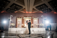 Dreamy indian couple during their first dance first dance,indian newlyweds,indian wedding reception