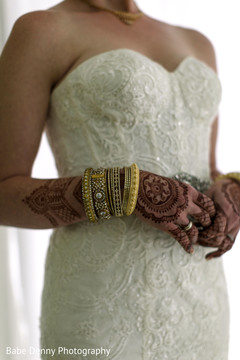 Indian bride hand henna design. white wedding dress,bridal fashion,bridal mehndi,indian bride bangles