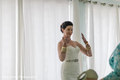 Indian bride fusion look. getting ready,indian wedding photography,white wedding dress