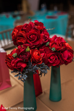 Inspiring red Indian wedding floral centerpieces. indian wedding reception,planning and design,floral and decor