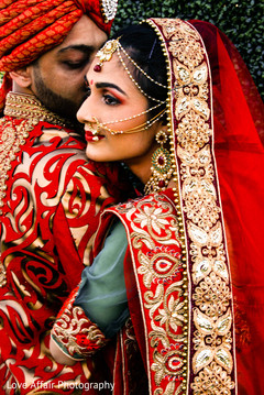 Indian bride and groom model posing for photo shoot indian bride fashion,indian groom fashion,bridal jewelry