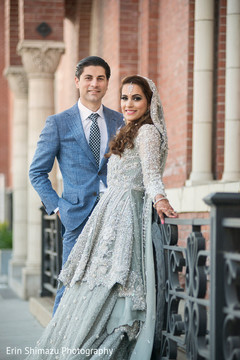 Glamorous Indian bride and groom indian bride reception look,indian groom reception look
