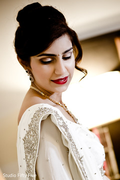 Glamorous Parsi Indian bridal style. getting ready,indian parsi bride,white sari,hair and makeup