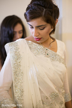 Stunning traditional bridal white saree. getting ready,indian parsi bride,white sari,hair and makeup
