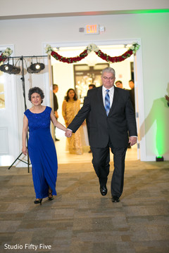 Indian Groom's parents entrance. indian wedding reception,planning and design