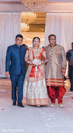 Indian bride making her entrance to wedding ceremony indian bride fashion,indian bridal bouquet,indian wedding ceremony