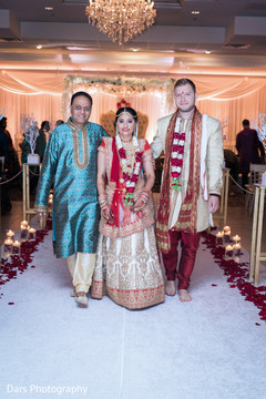 Indian bride and groom leaving wedding ceremony indian groom fashion,indian bride fashion,indian wedding ceremony