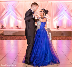Indian bride and groom's first dance scene indian wedding reception,indian bride fashion,indian groom suit,dj and entertainment