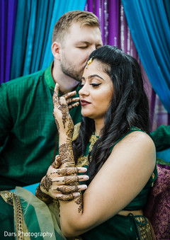 Enchanting indian bride and groom capture pre- wedding celebrations,indian bride and groom,mehndi art