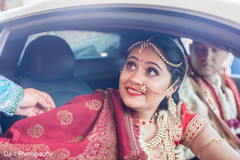 Indian bride and groom's leaving wedding venue indian bride and groom,bridal jewelry