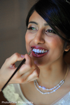 Lovable Indian bride makeup. indian bride,getting ready,hair and makeup