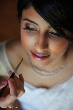 Indian bride gets all dolled up. indian bride,getting ready,hair and makeup