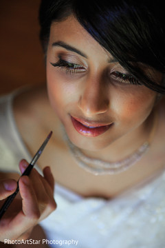 Indian bride gets all dolled up. indian bride,getting ready,hair and makeup