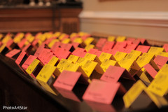 Colorful Indian wedding reception seating cards. Colorful Indian wedding reception seating cards.