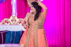 Charming indian bride giving a dance performance Charming indian bride giving a dance performance