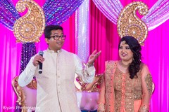 Indian groom giving a speech at sangeet pre- wedding celebrations,sangeet,indian bride and groom