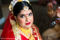 Charming indian bride getting ready indian bride hair and makeup,indian bride getting ready,bridal jewelry