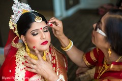 Indian bride's getting ready capture indian bride hair and makeup,indian bride getting ready,bridal jewelry