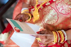 Indian bride reading a card capture indian bride,bridal jewelry,bride bangles,mehndi art