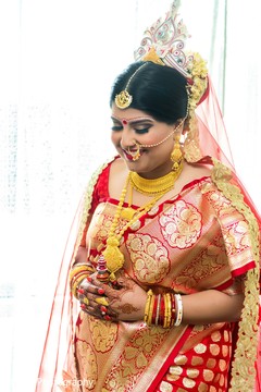 Indian bride wearing traditional wedding outfit indian bride hair and makeup,indian bride fashion,bridal jewelry
