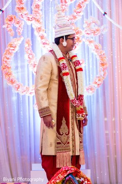 Elegant indian groom at wedding ceremony perfect indian bridal mehndi art