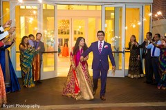 Elegant indian bride and groom at wedding reception venue indian wedding reception,fireworks,indian bride and groom