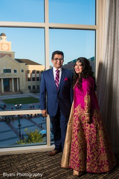 Ravishing indian bride and groom posing for photo shoot indian bride and groom portrait,indian wedding reception,indian bride fashion,indian groom suit