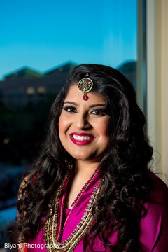 Indian bride smiling for photo shoot indian wedding reception,indian bride fashion,indian bride portrait,bridal jewelry