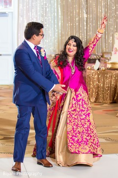 Joyful indian bride and groom's entrance indian bride fashion,indian groom suit,indian wedding reception
