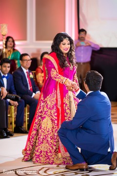 Indian bride and groom's romantic moment indian bride and groom,indian wedding reception,indian wedding reception photography