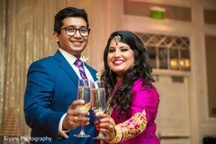 Indian bride and groom toasting indian wedding reception,indian bride and groom,indian wedding reception photography