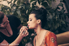 Indian bride gets all dolled up. indian bride,getting ready,hair and makeup