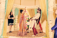 Indian couple at their wedding ceremony. indian wedding ceremony,mandap,indian bride and groom
