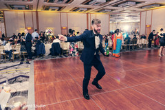 Indian groom at the dance floor. indian wedding reception,indian groom,dj