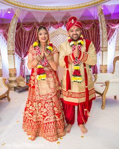 Ravishing indian couple at their wedding ceremony indian bride fashion,indian groom fashion,indian wedding ceremony